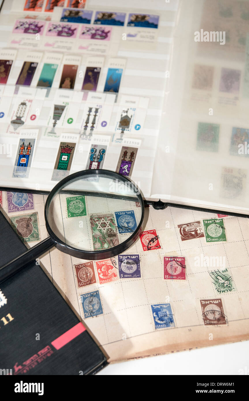 Israel Stamp collecting hobby with stamp catalogue Stock Photo Alamy