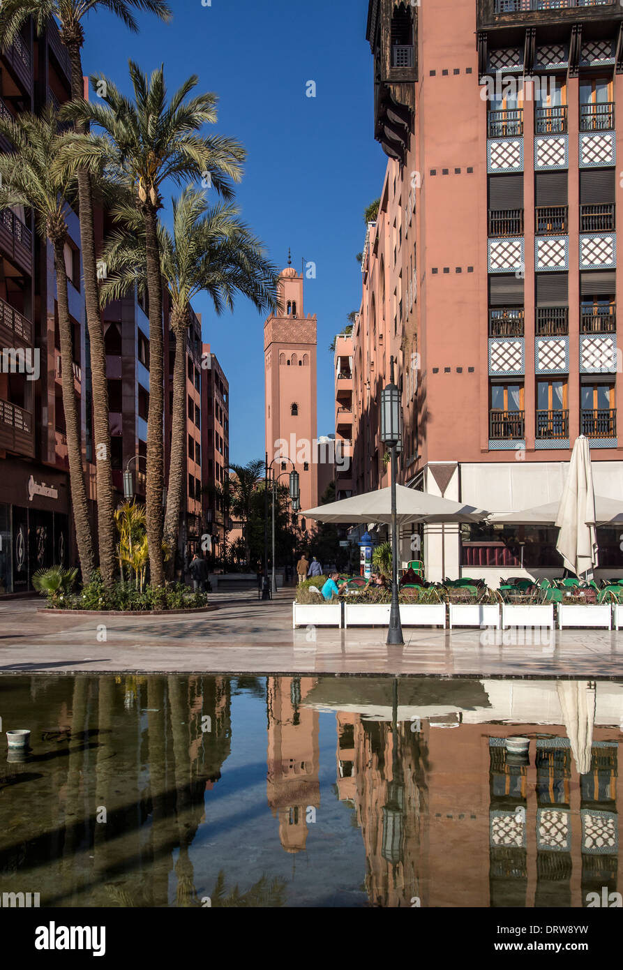 MARRAKECH, MOROCCO - JANUARY 21, 2014: Western style offices and Mosque in Plaza at Place du 16 Novembre, Gueliz, Ville Nouvelle Stock Photo