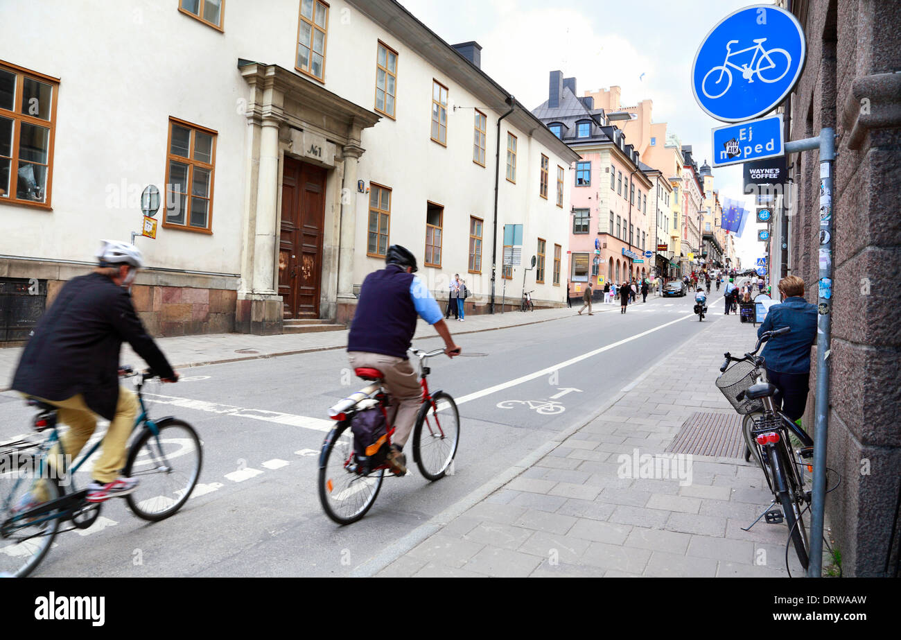 Cyclists and people on Götgatan, Södermalm, Stockholm, Sweden. Stock Photo