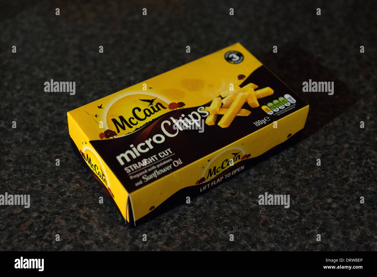 Microwave potato chips frozen fries boxes box Stock Photo - Alamy