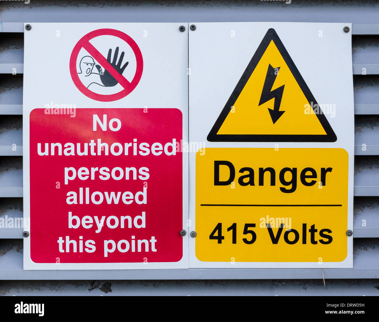 Danger High Voltage No Unauthorised Persons sign Stock Photo