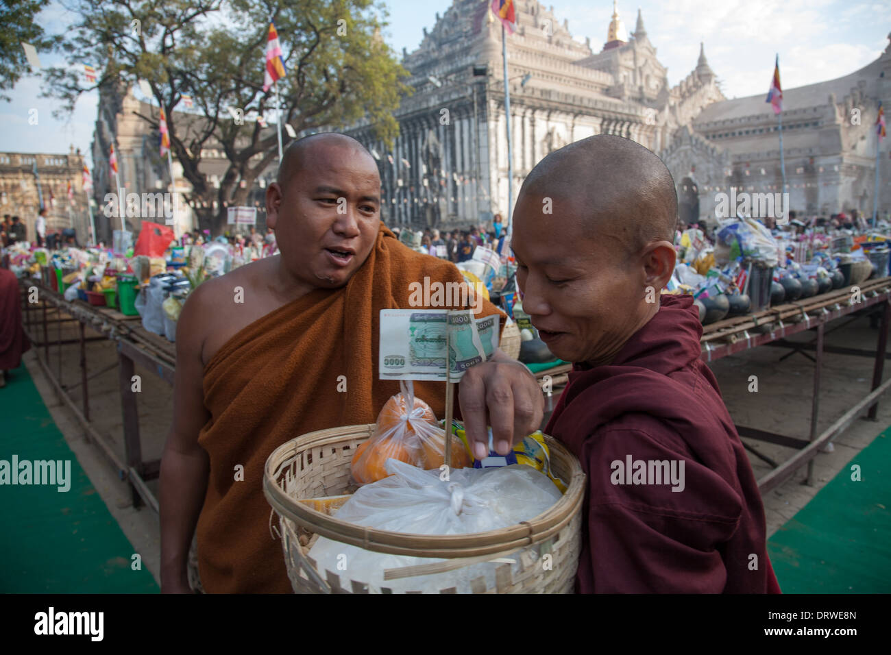 Monks receiving alms during The Ananda Festival Bagan, Myanmar (Burma ...