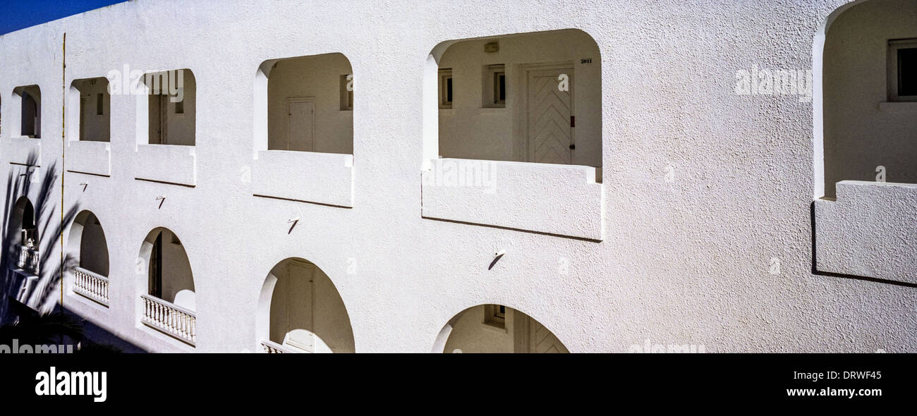 White hotel and apartment buildings at holiday destination Stock Photo