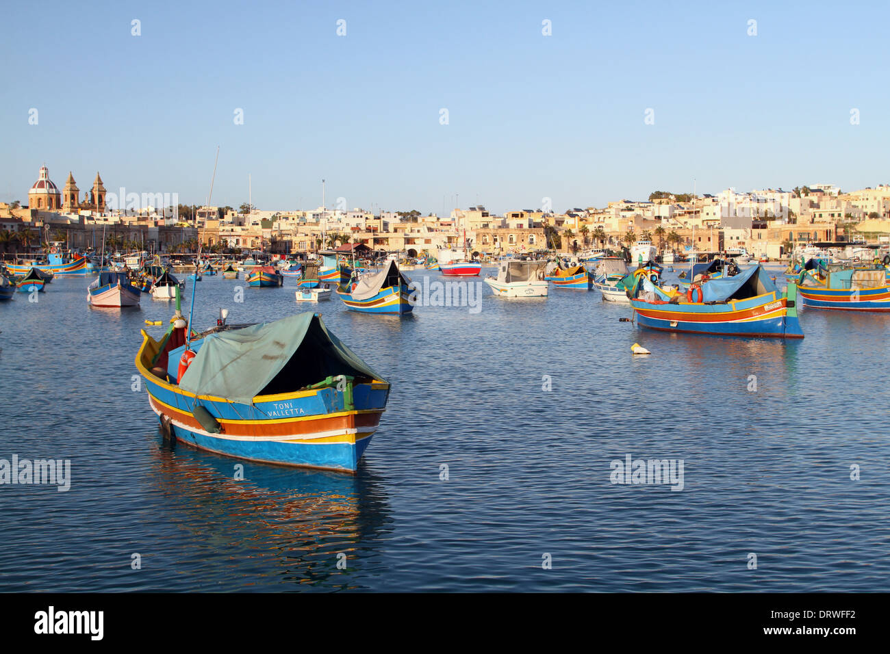 Coloured fishing boats hi-res stock photography and images - Alamy
