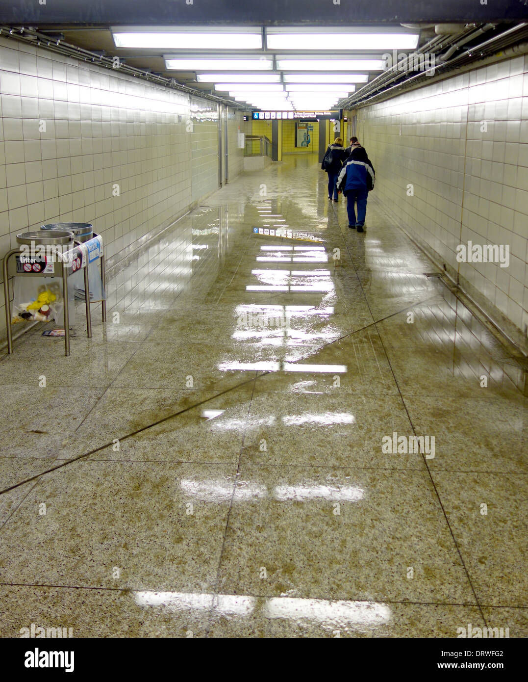 Wet floor in a subway station walkaway in Toronto, Canada Stock Photo