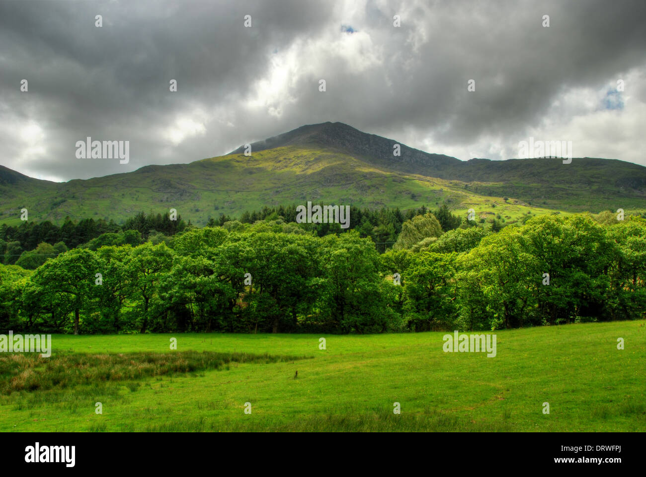 Clouds over a Welsh hill in Snowdonia National Park Stock Photo