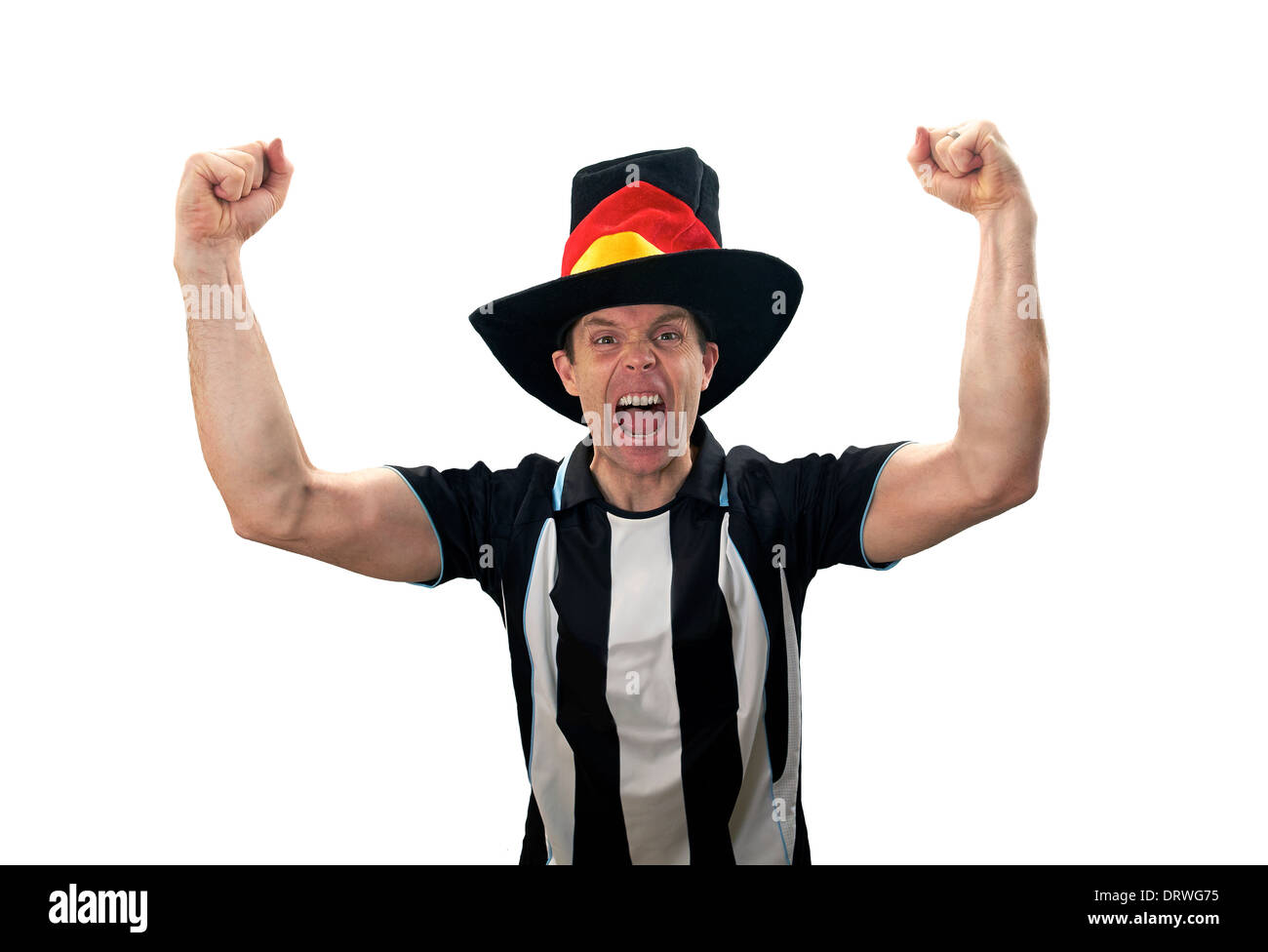 A man celebrating a goal at a football match on a white background. Stock Photo