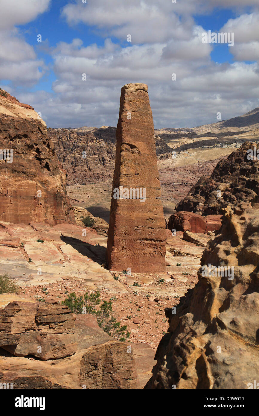 One of the two obelisks marking the entrance to the High Place of Sacrifice overlooking the ancient city Petra, southern Jordan. Stock Photo