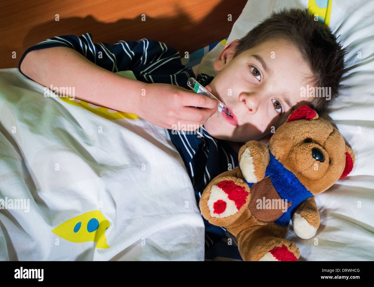 Sad child with teddy bear hi-res stock photography and images - Alamy