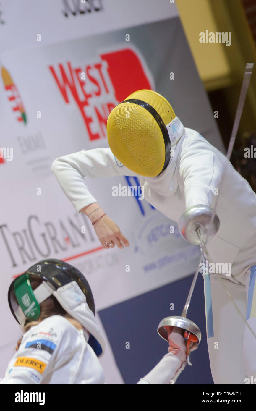 Budapest, Hungary. 2nd Feb, 2014. Ana Maria Branza (R) of Romania competes with Irina Embrich of Estonia during the final of the Westend women's epee Grand Prix in Budapest, Hungary, on Feb. 2, 2014. Branza won 15-7. Credit:  Attila Volgyi/Xinhua/Alamy Live News Stock Photo