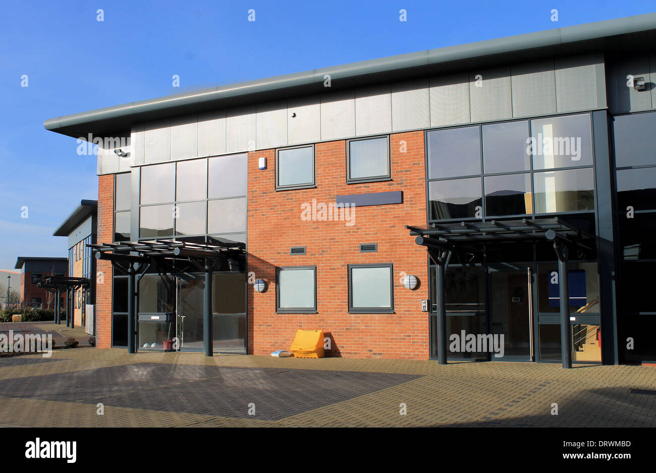 Exterior of empty modern commercial office buildings on business park, England. Stock Photo