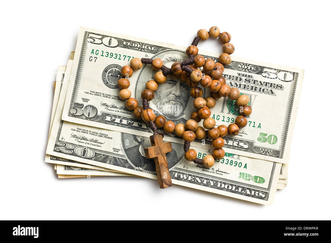 rosary with american dollars on white background Stock Photo