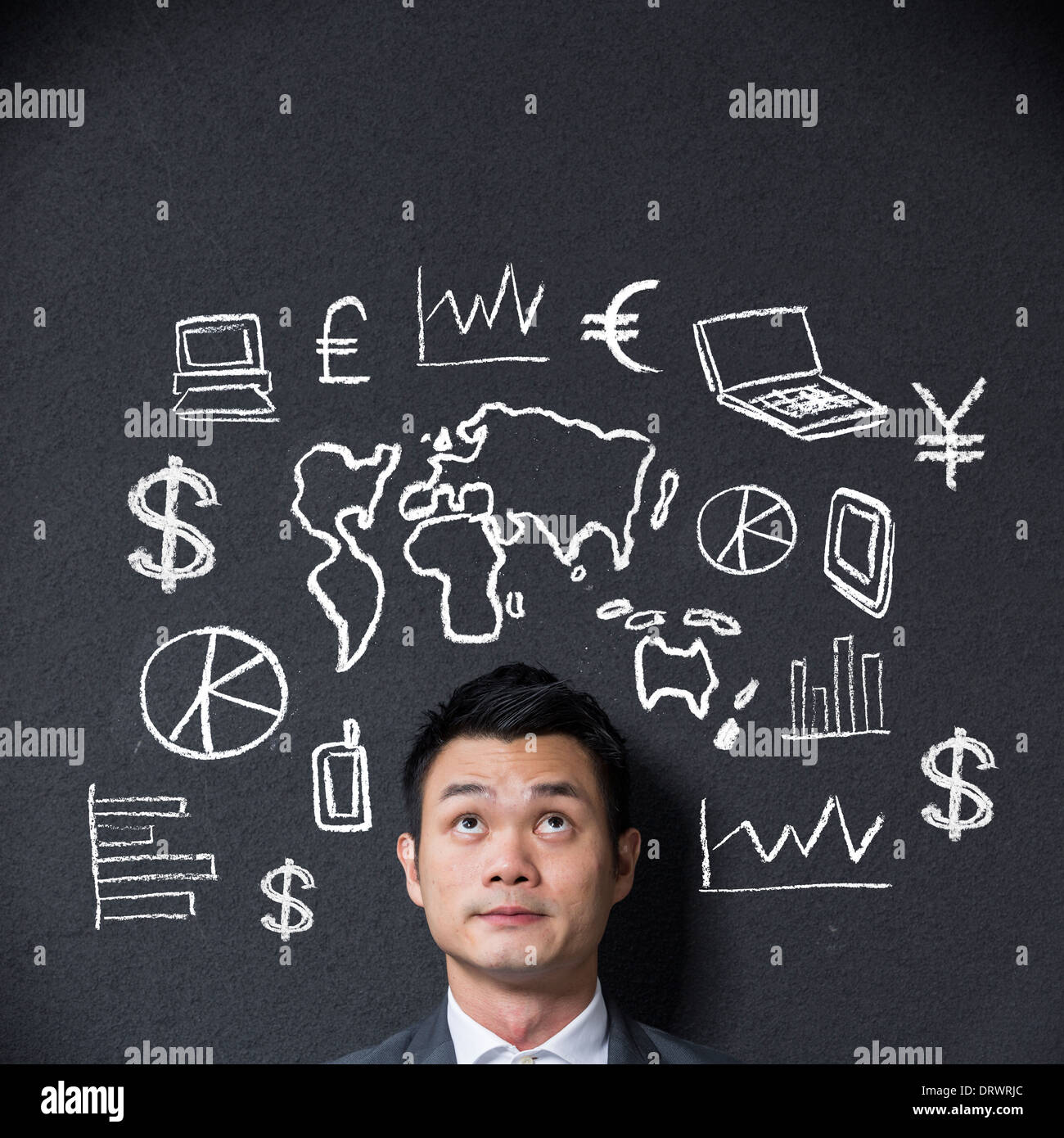Chinese businessman in front of a sketch or diagram about business and Commerce Stock Photo