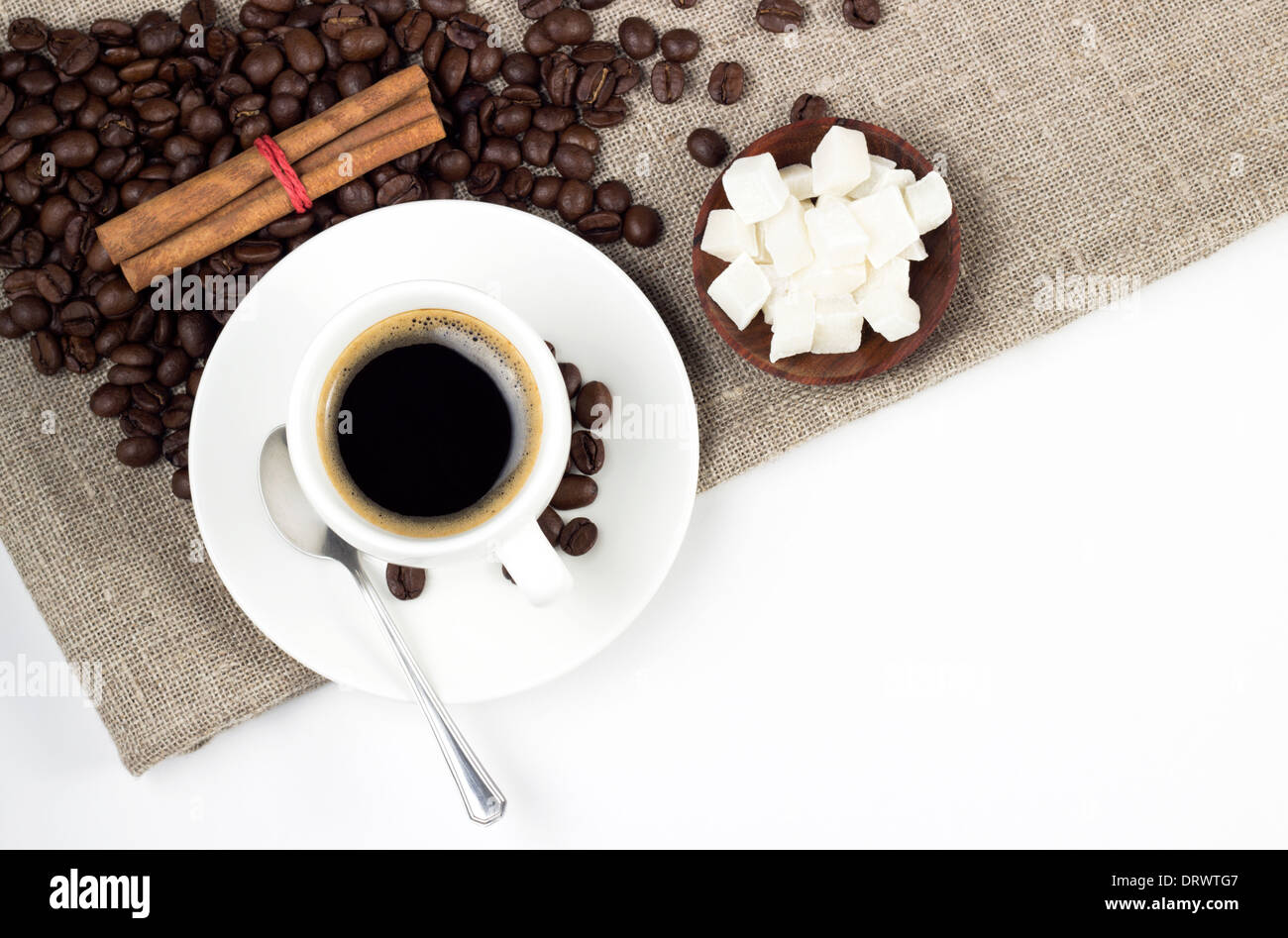 coffee cup with roasted beans and snacks Stock Photo