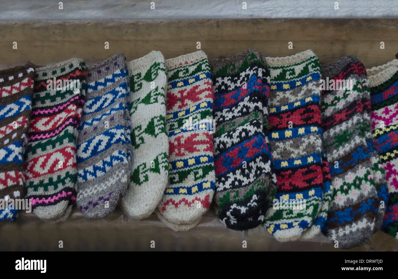 Traditional bulgarian colourful wool stocking knitted by hand Stock Photo