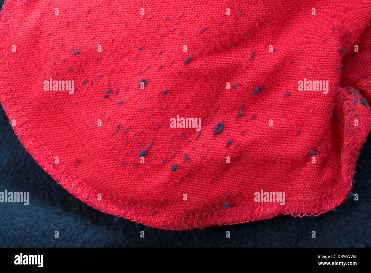 pilling - nodules and fluff on pocket inside tracksuit bottoms Stock Photo