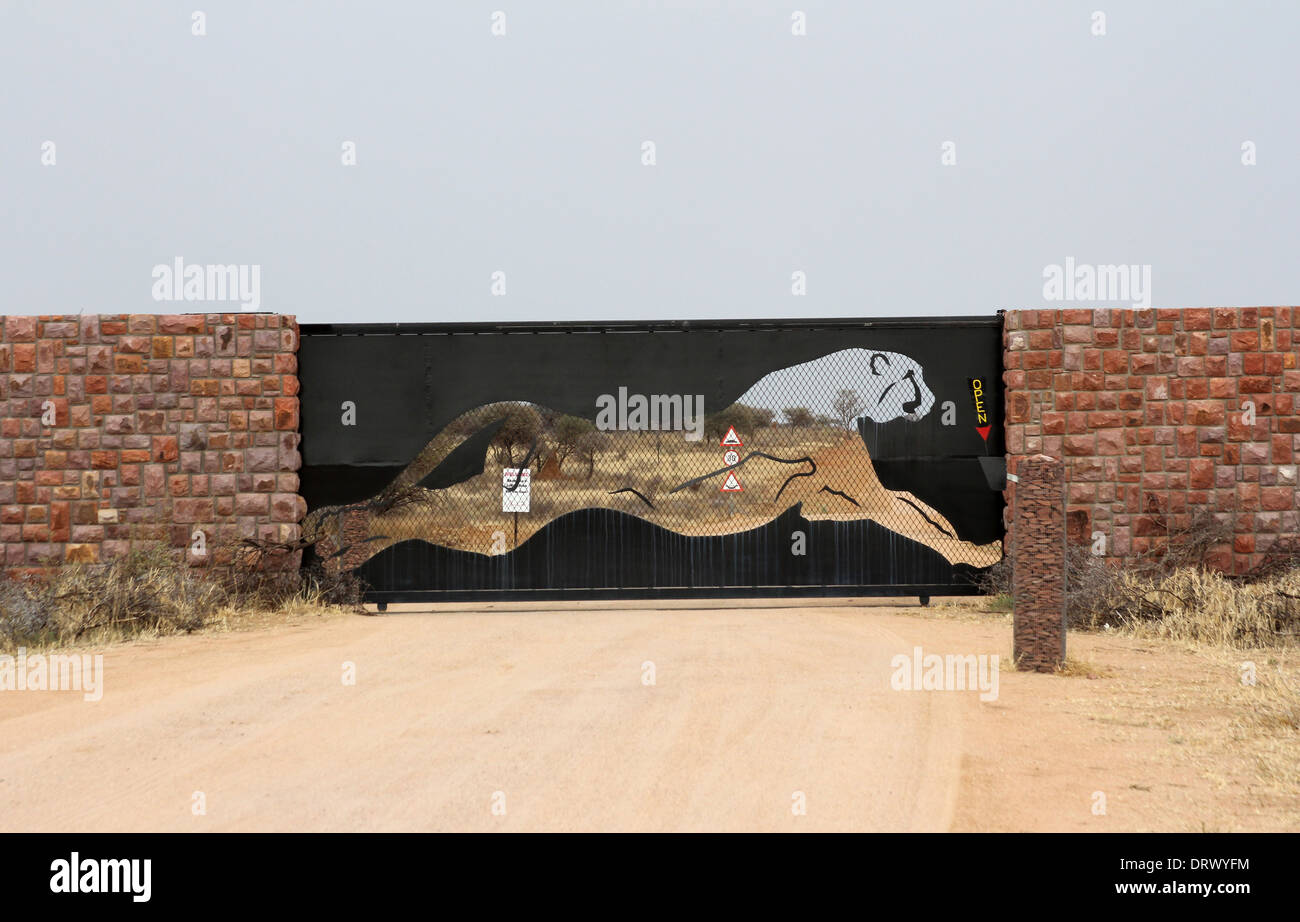 Prancing leopard entrance gate to the Africa leopard and cheetah reserve in Namibia,Africa. Stock Photo