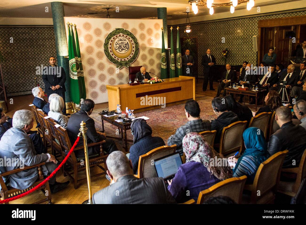 Cairo, Egypt . 03rd Feb, 2014. Arab League chief Nabil al-Arabi (C) speaks during a press conference at the Arab League headquarters to highlight the results of Geneva II peace talks, in Cairo. Feb. 3 2014. Nabil al-Arabi said that the presence of a representative of the Syrian government can be considered as a political victory to the opposition. Credit:  Xinhua/Alamy Live News Stock Photo