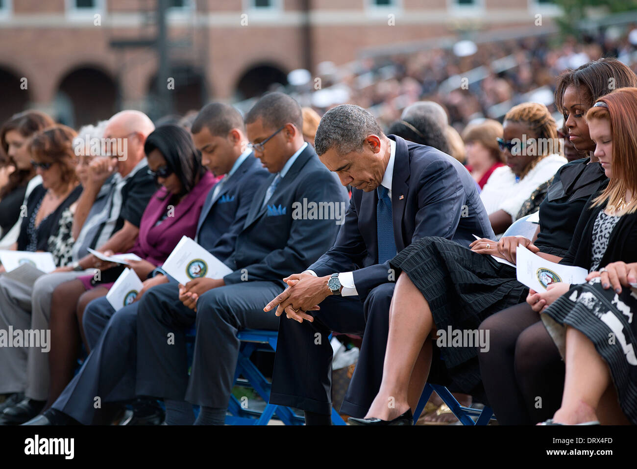 US President Barack Obama and First Lady Michelle Obama attend a memorial service for victims of the Washington Navy Yard shootings at the Parade Grounds, Marine Barracks September 22, 2013 in Washington, DC. Stock Photo