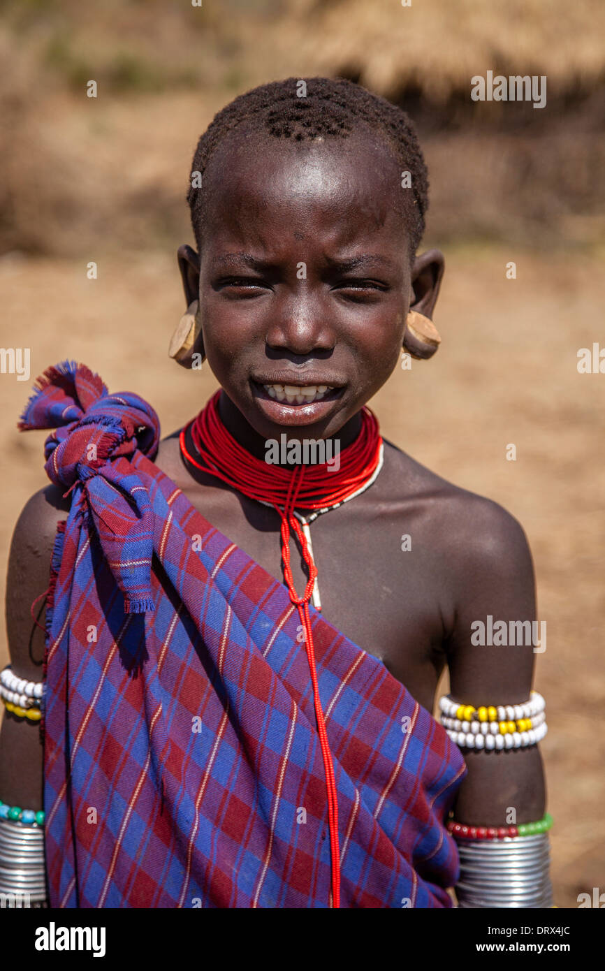 Portrait Of A Mursi Boy, Mursi Tribal Village, The Omo Valley, Ethiopia Stock Photo