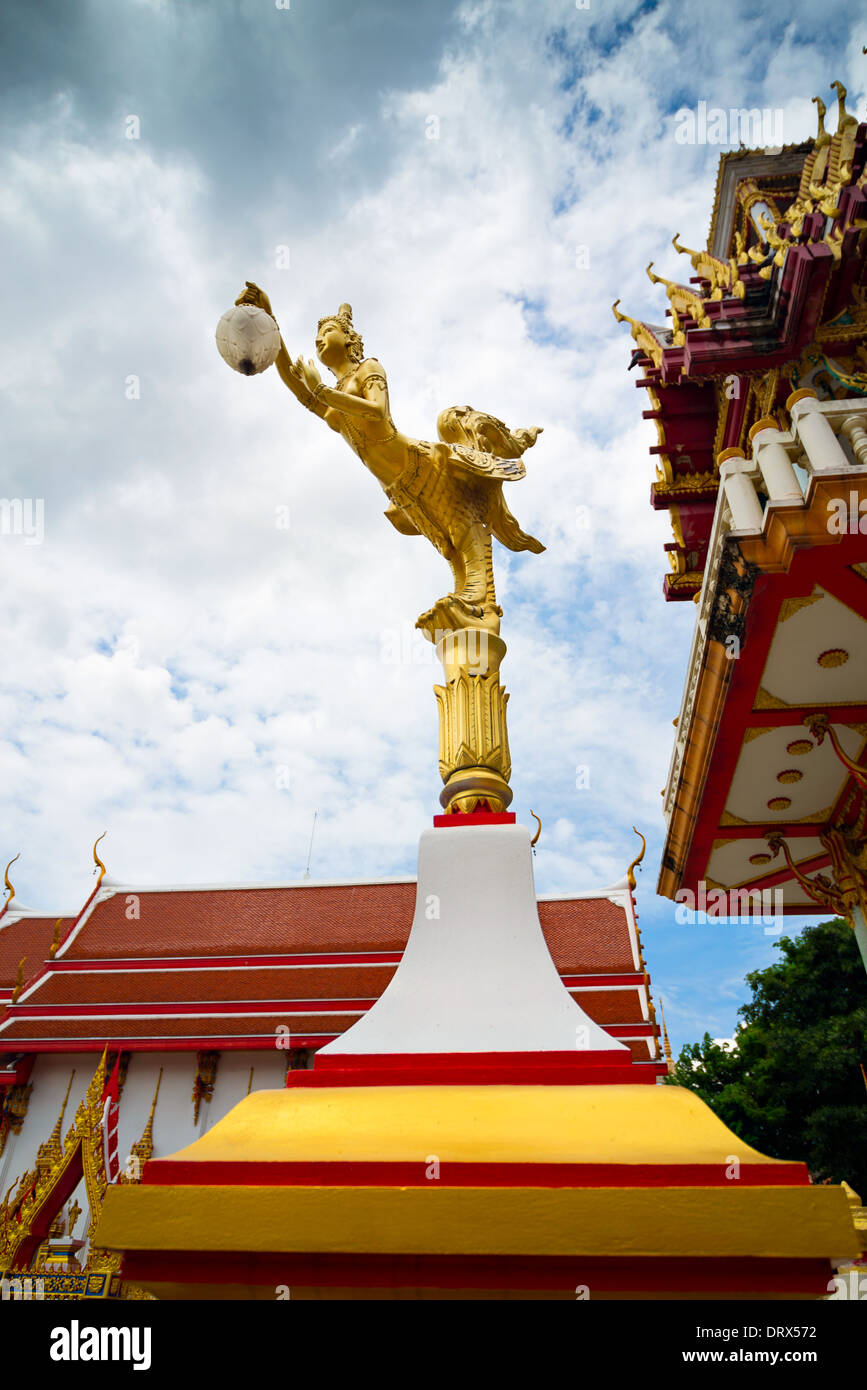 Gold Thai sculpture, gold statue lamp post at a Thai Temple, Minburi, Bangkok, Thailand Stock Photo