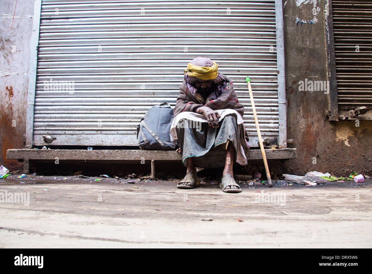 Homeless man in Old Delhi, India Stock Photo