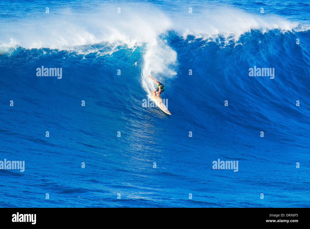 Extreme Surfer Riding Giant Ocean Wave In Hawaii Stock Photo Alamy