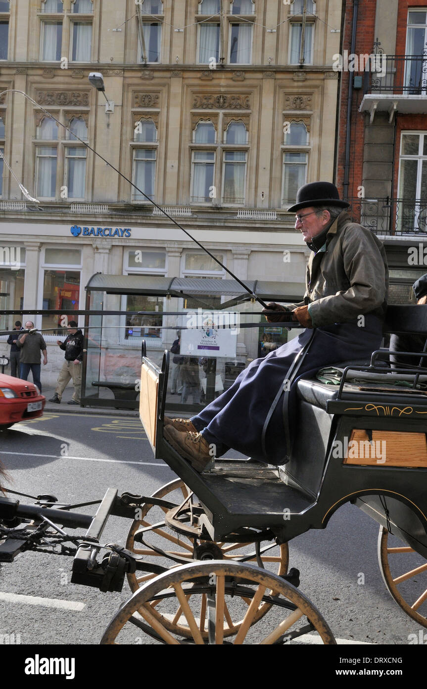 Coachmen on carriage, Windsor, UK Stock Photo