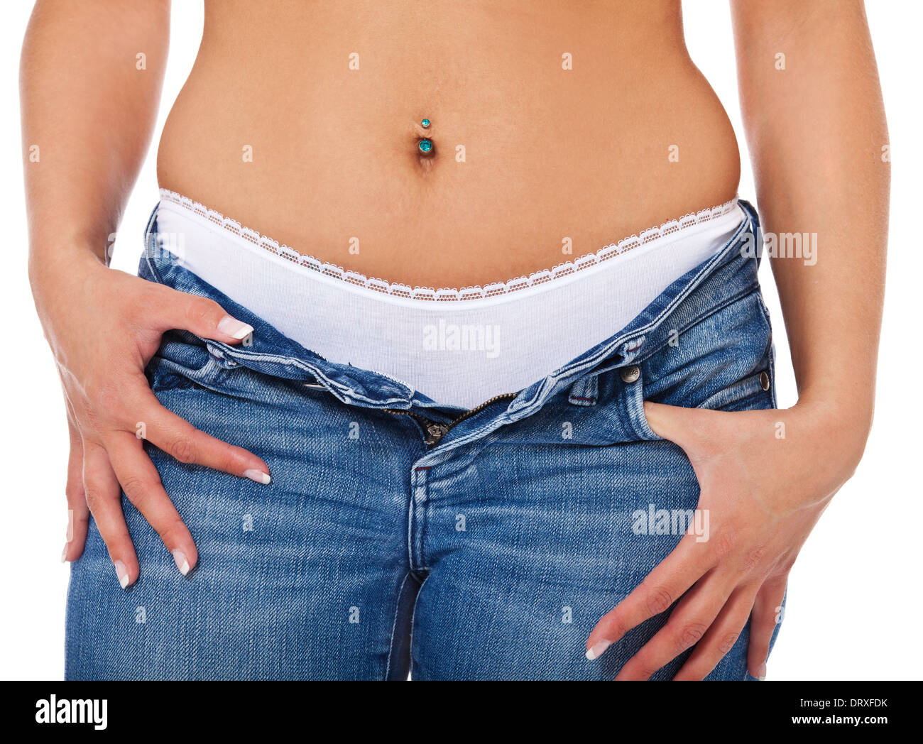 Attractive young woman in bluejeans. All on white background Stock