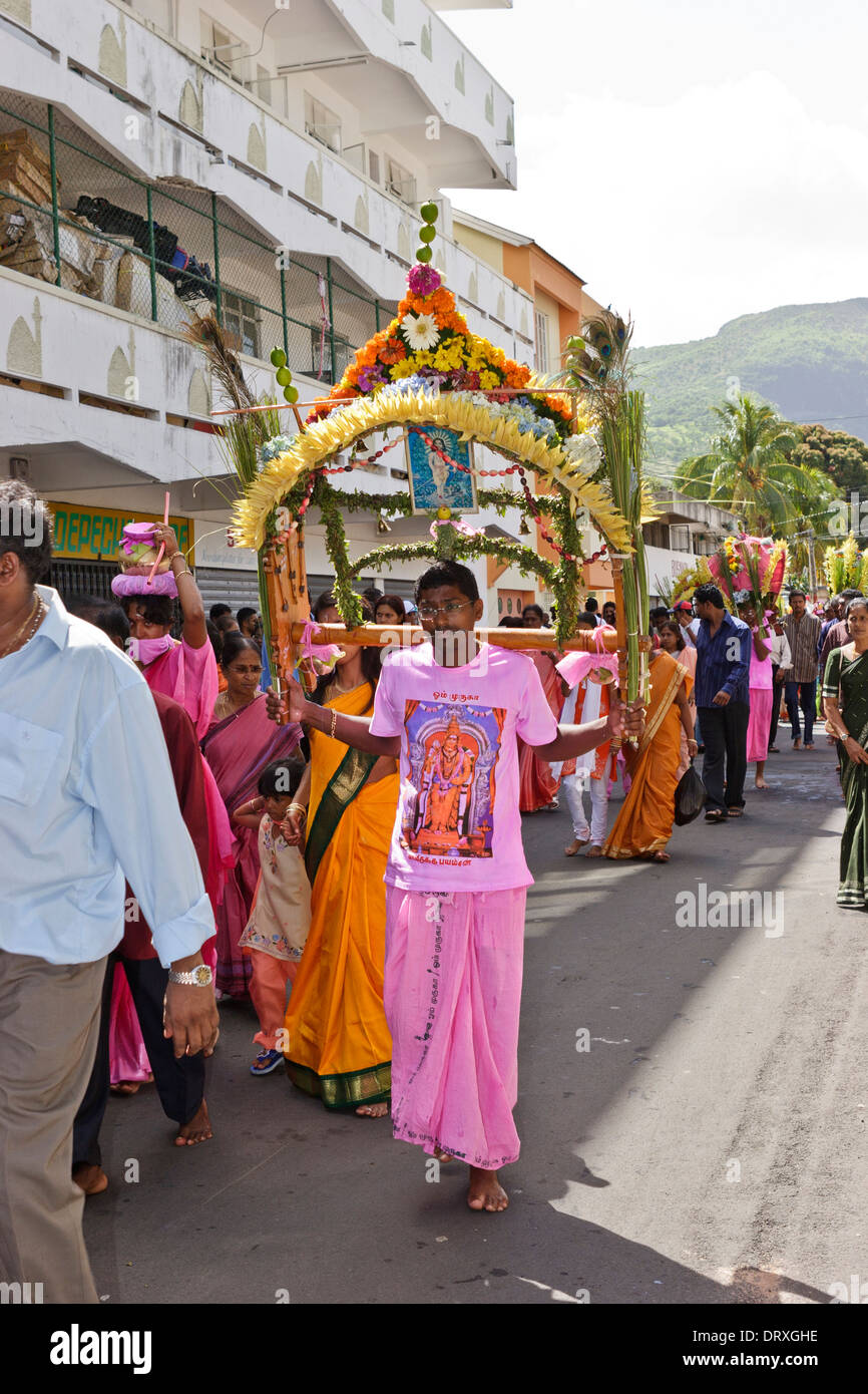 A Tamil devotee carrying a decorative cavadee during the Thaipoosam
