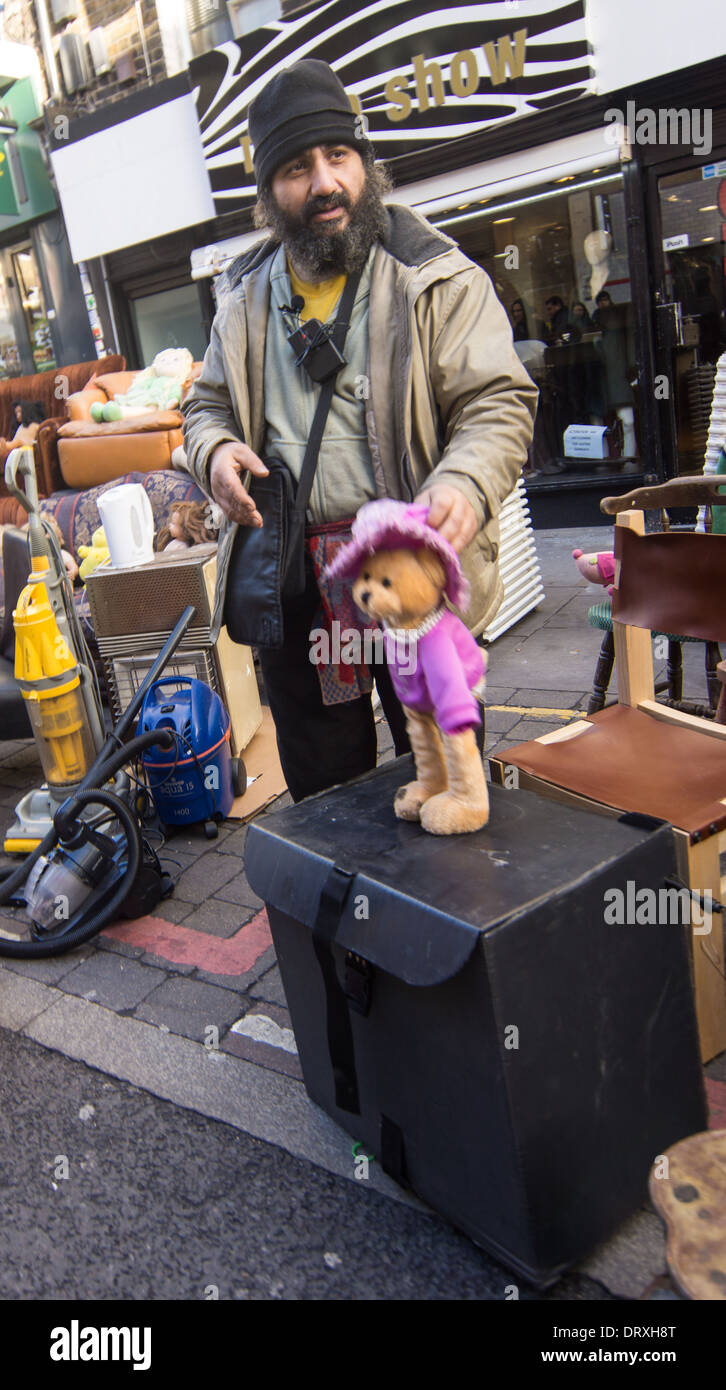 street trader brick lane    stall holder with toy Stock Photo