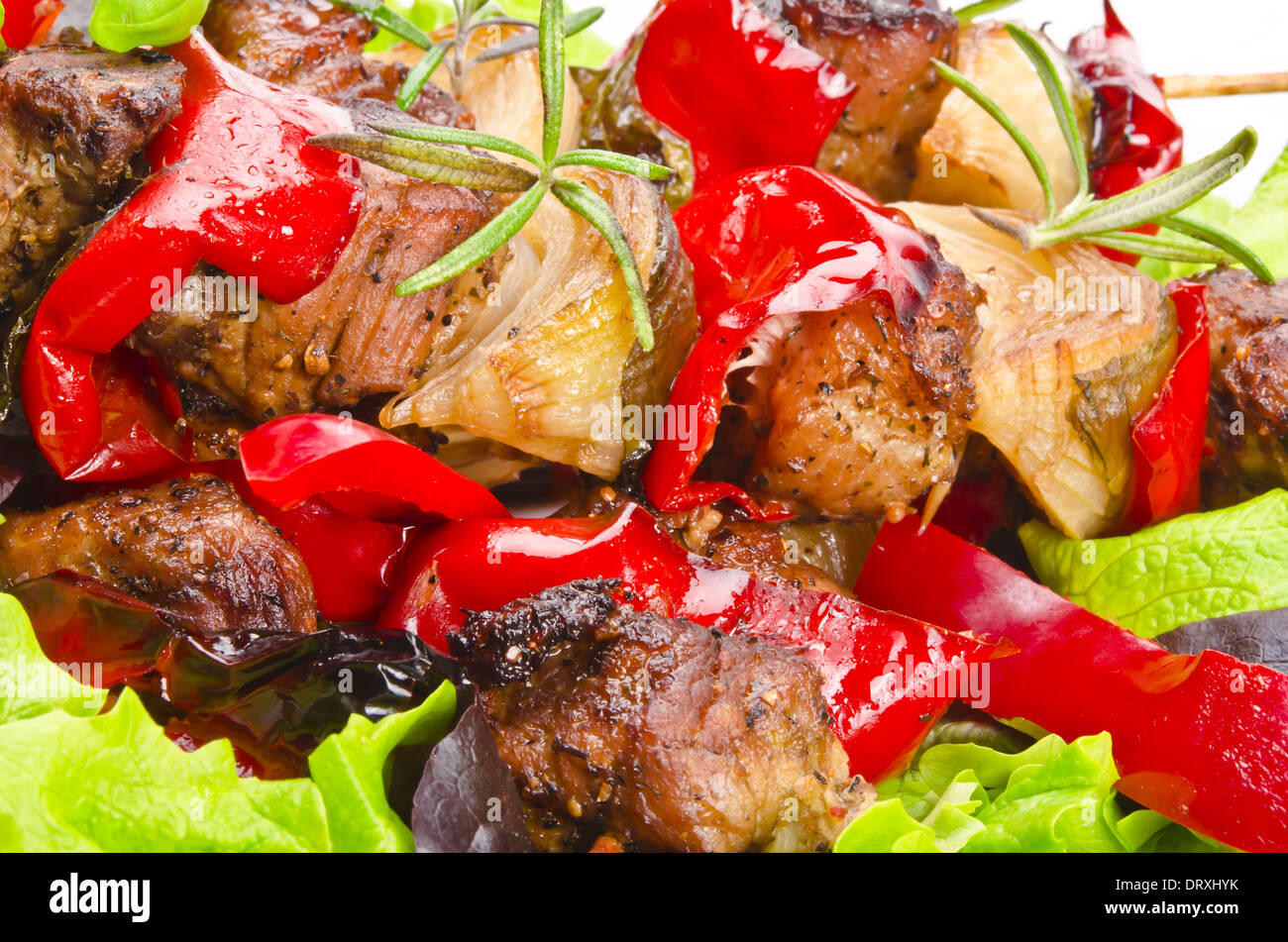 Meat spit with fried potatoes Stock Photo Alamy