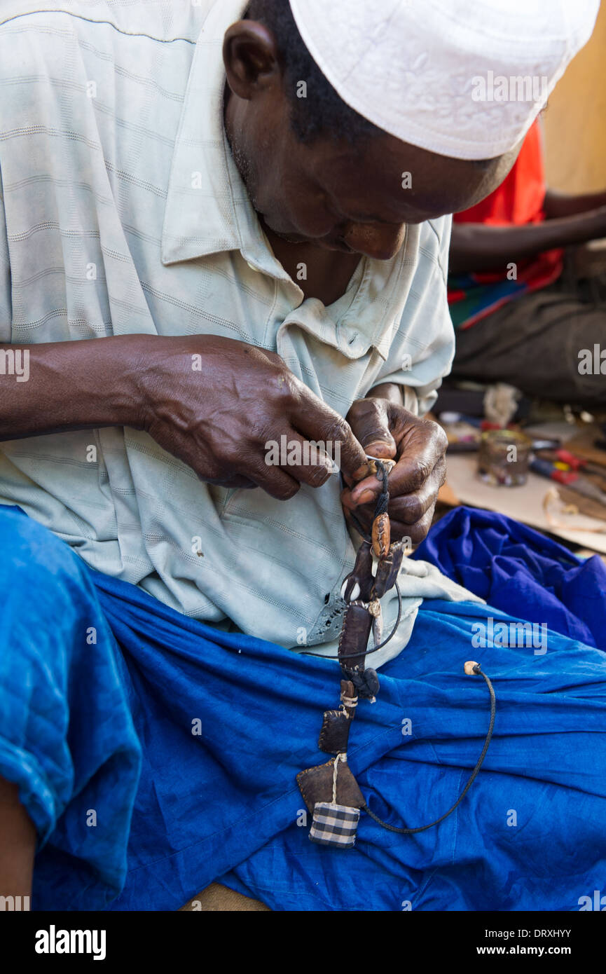 Man making gris-gris, Royal Albert Market, Banjul, the Gambia Stock Photo