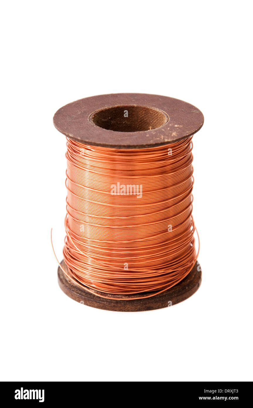 Copper wire rolled up on a spool Stock Photo - Alamy