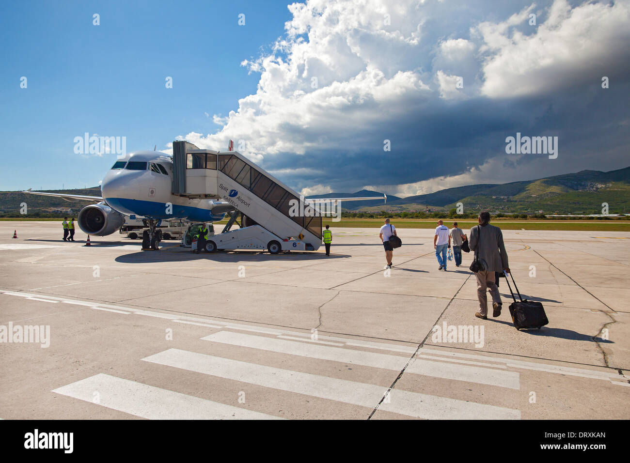 SPLIT, CROATIA - JUN 6: Croatia Airlines Airbus A319 parked on a runway of Split Airport during boarding on June 6, 2013 Stock Photo