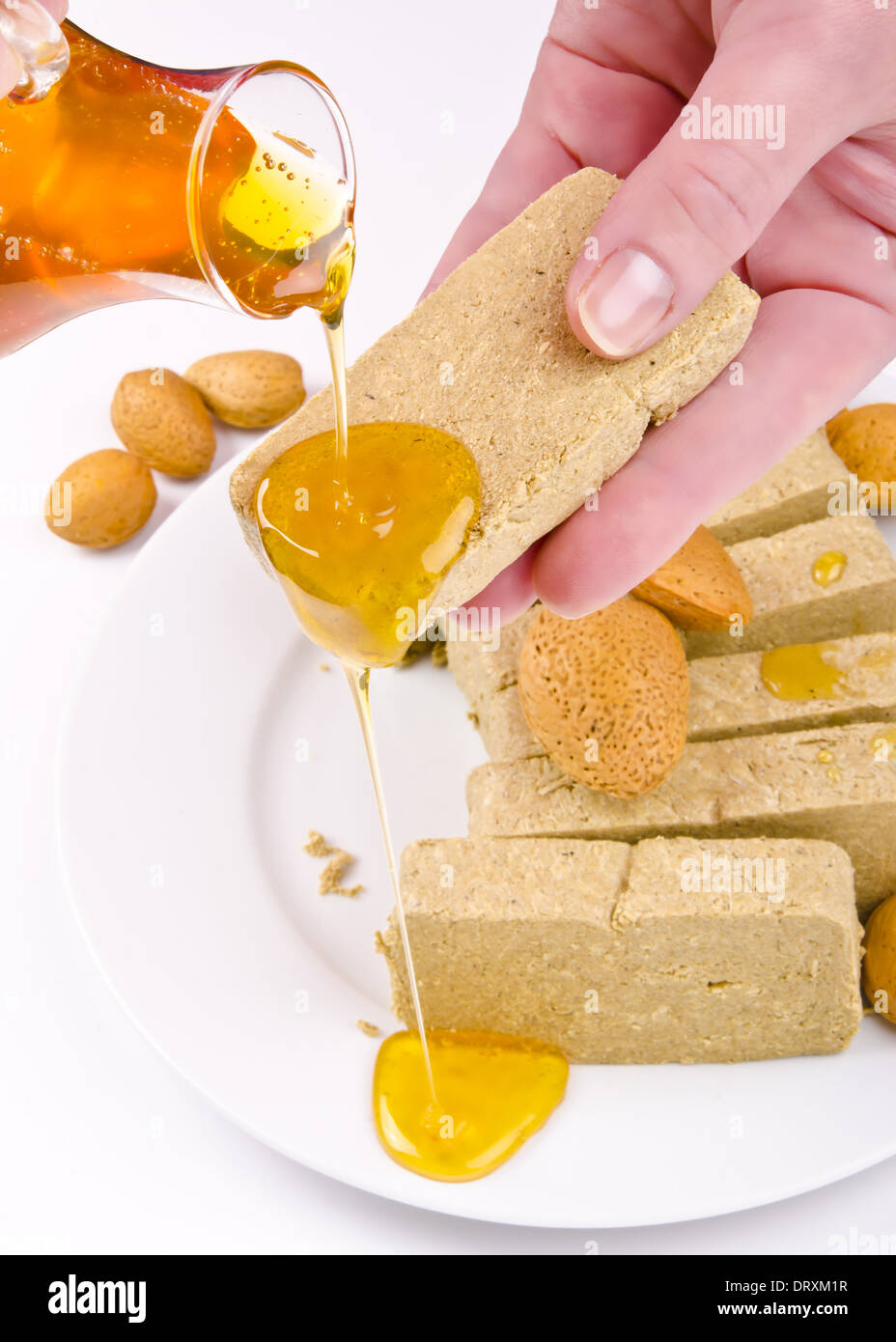 halva with honey Stock Photo Alamy