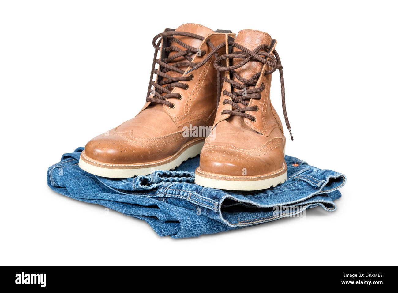 Hiking boots with blue jeans isolated over white with clipping path. Stock Photo