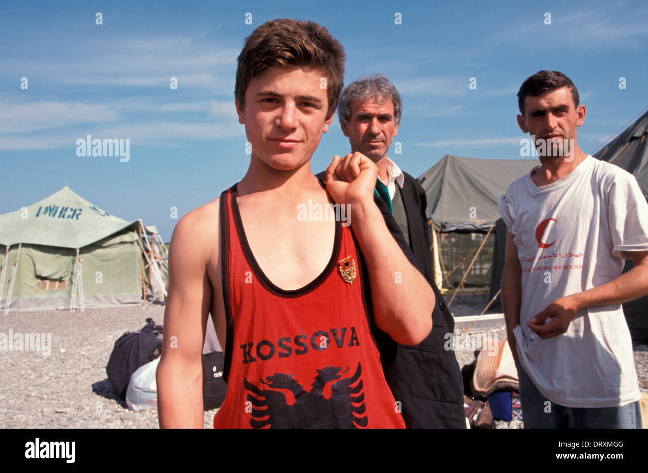 Male Kosovans fleeing th war in Kosovo in 1999 at a UNHCR refugee camp in Albania Stock Photo