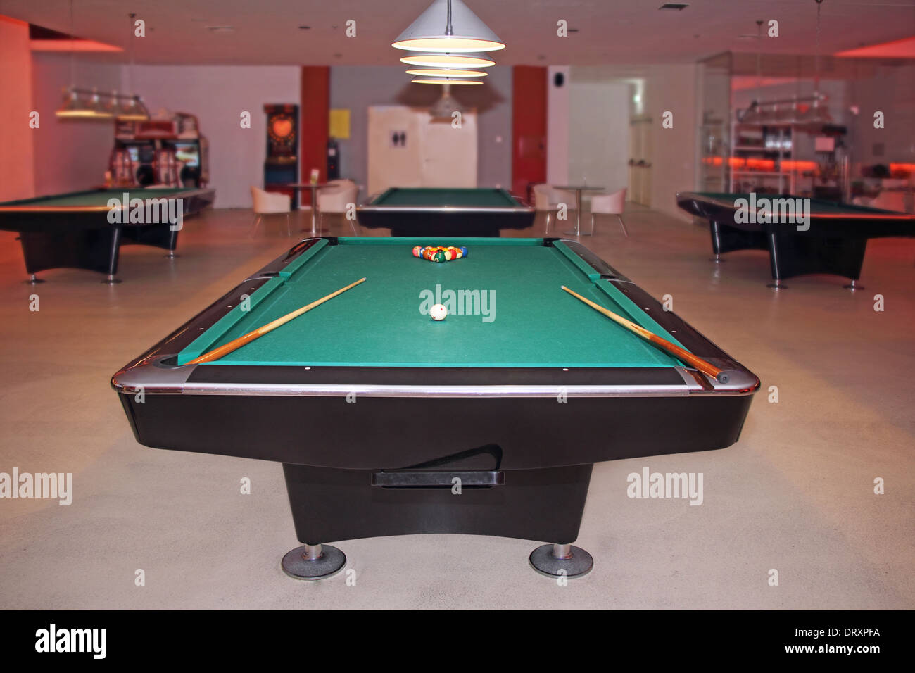 Billiard table in an empty hall to play Stock Photo