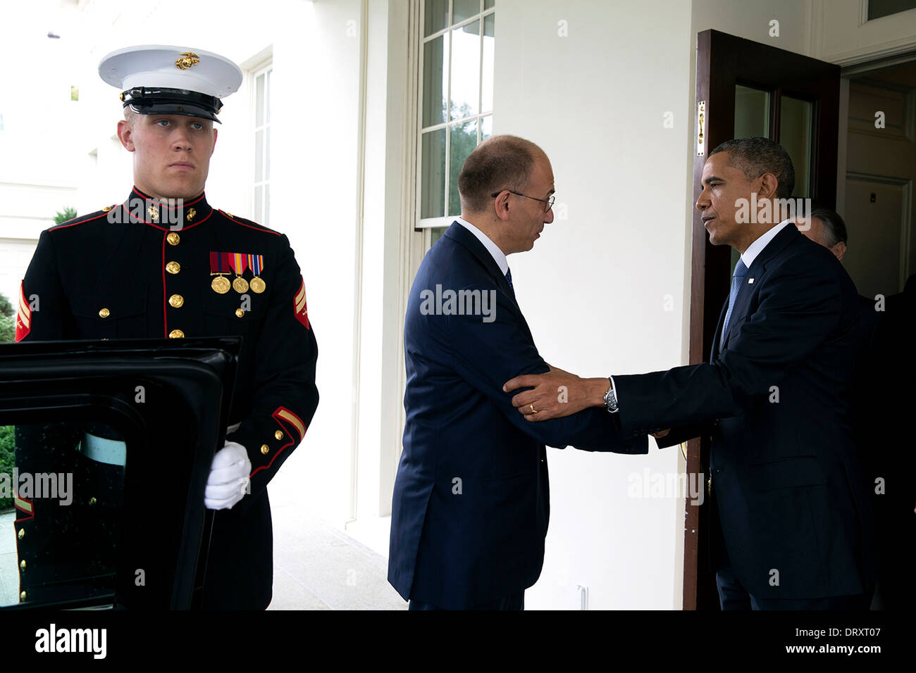 US President Barack Obama bids farewell to Prime Minister Enrico Letta of Italy outside the West Wing of the White House October 17, 2013 in Washington, DC. Stock Photo
