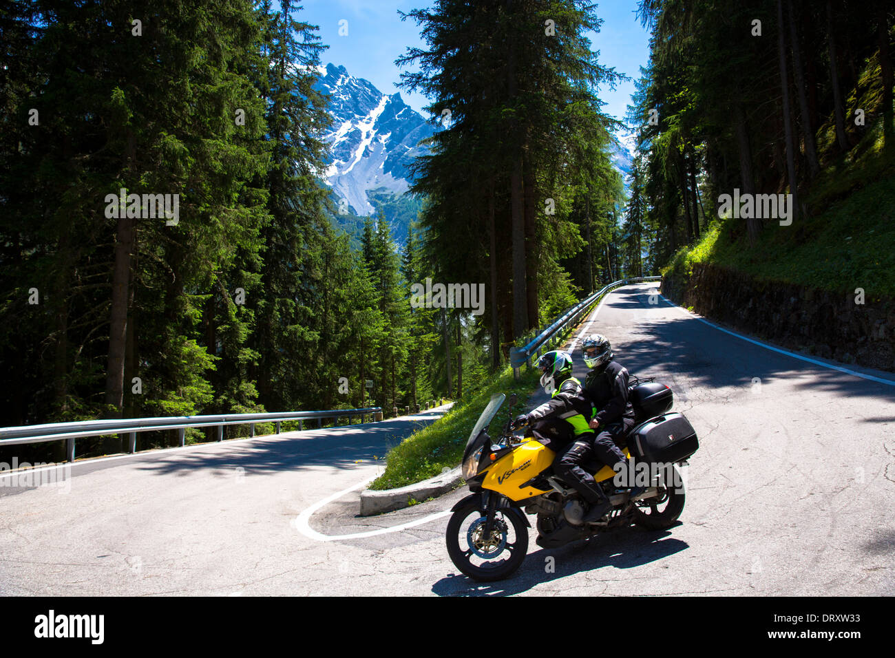 Suzuki Vstrom motorcycle on The Stelvio Pass, Passo dello Stelvio, Stilfser Joch, route to Trafio in The Alps, Italy Stock Photo
