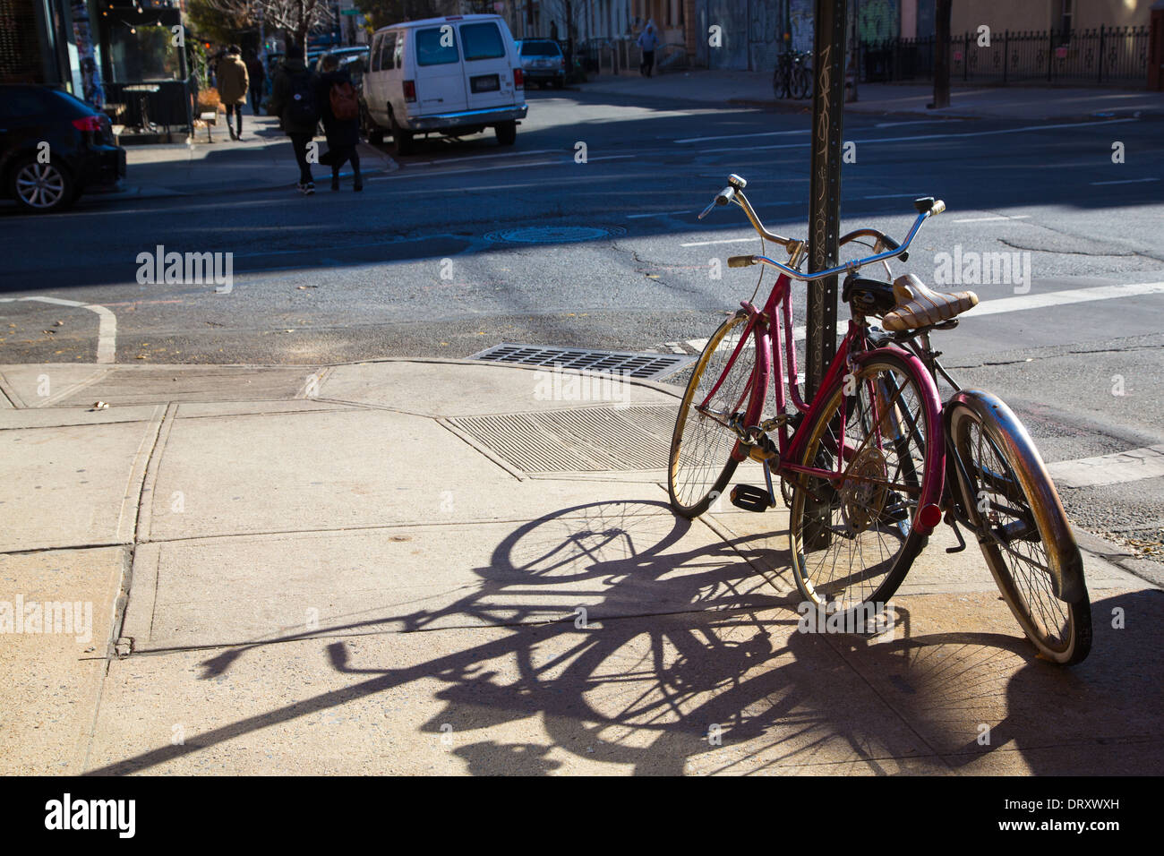 Two Bikes chained up, Williamsburg, Brooklyn, NYC, USA Stock Photo