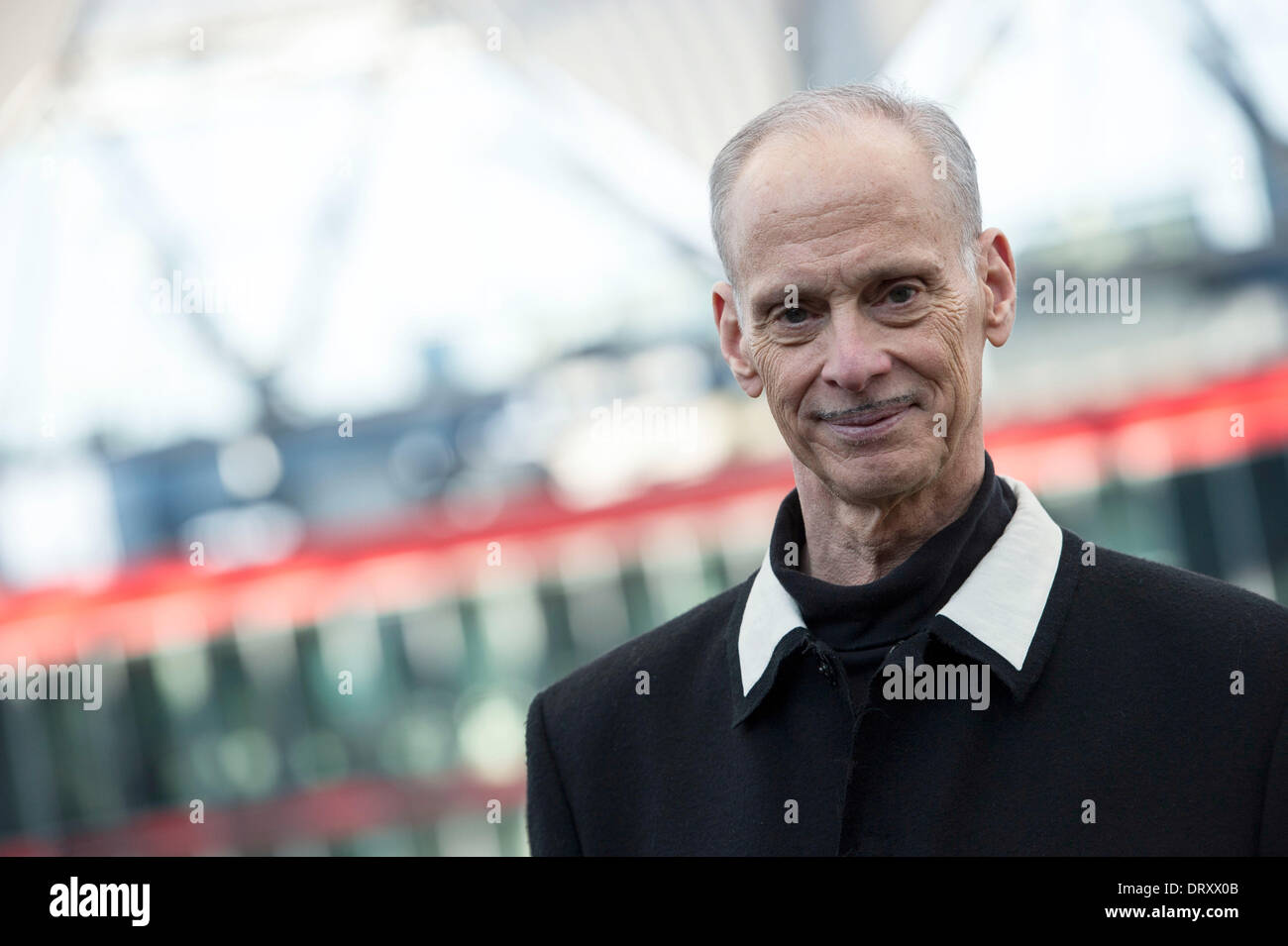 Berlin, Germany. 04th Feb, 2014. US American film director John Waters poses at the opening of his exhibition at the German Film and Television Academy Berlin (dffb) in Berlin, Germany, 04 February 2014. Photo: Paul Zinken/dpa/Alamy Live News Stock Photo