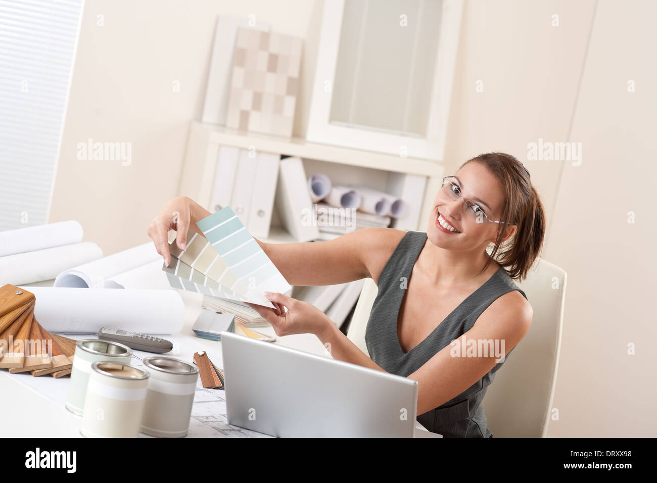 Female interior designer working at office Stock Photo