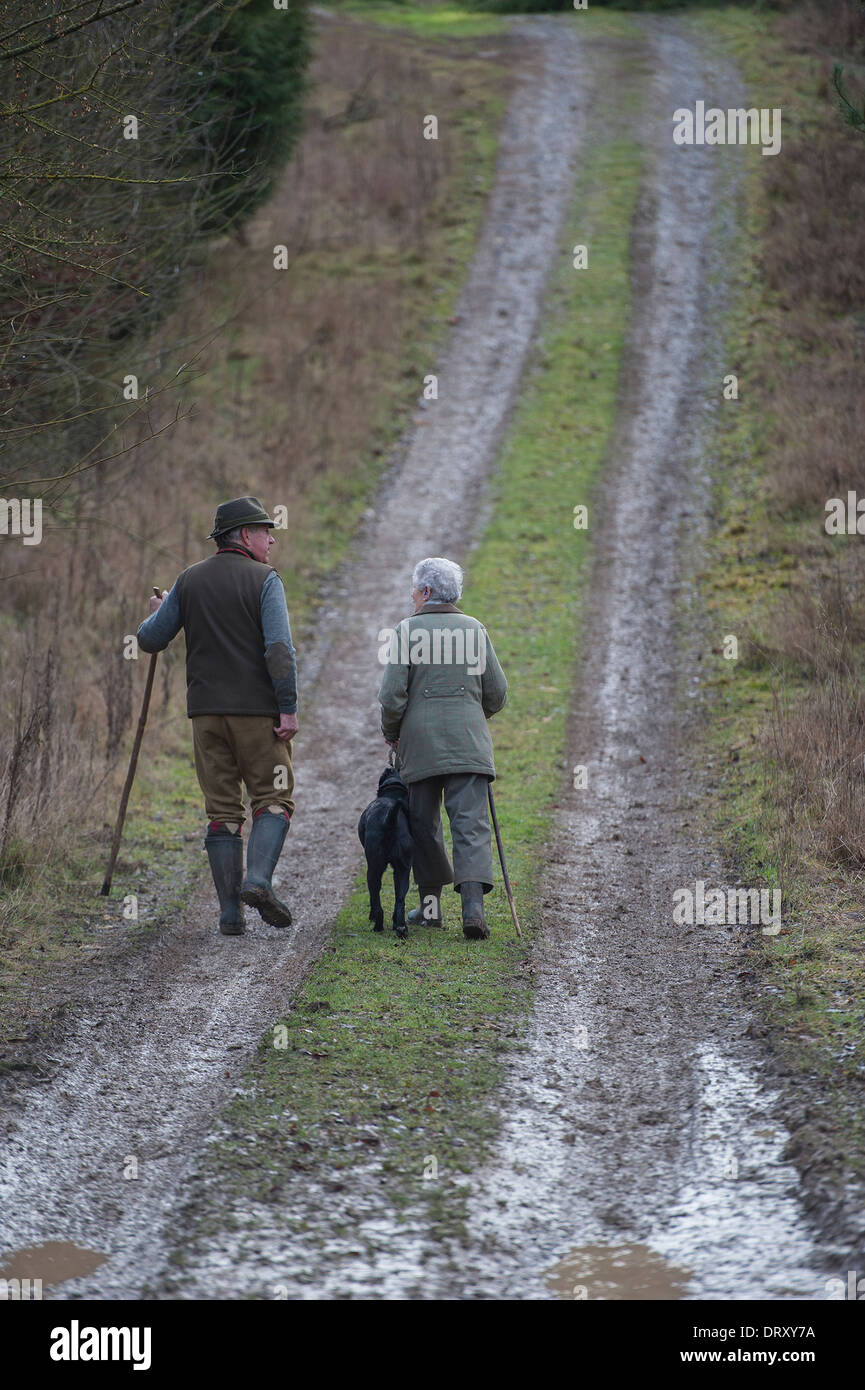 Couple Walk up country track Stock Photo
