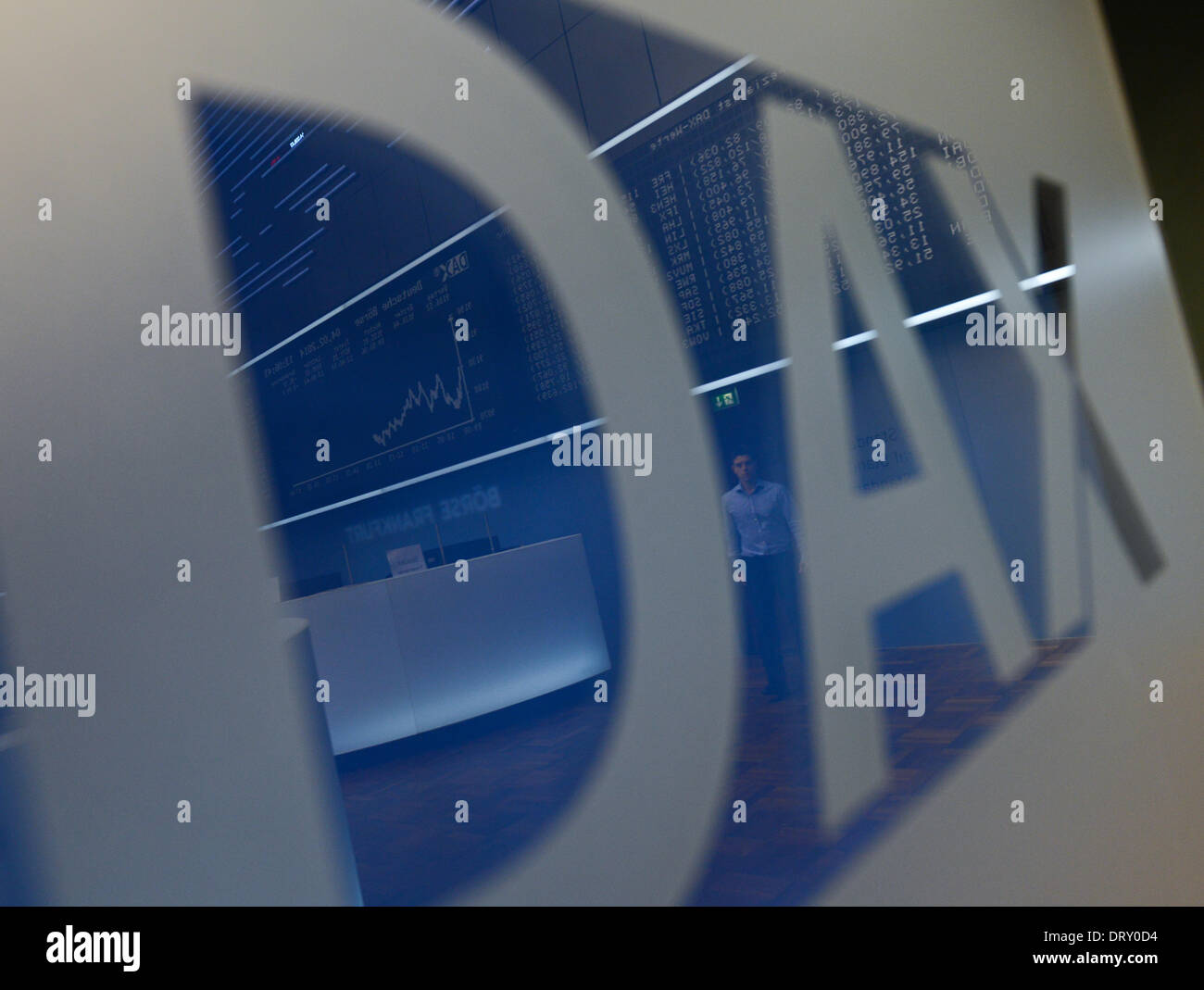Frankfurt Main, Germany. 04th Feb, 2014. The hall of the stock market is reflected in the Dax logo at the stock market in Frankfurt Main, Germany, 04 February 2014. Germany's Dax index dropped after a sharp fall in prices in Asia. Photo: Arne Dedert/dpa/Alamy Live News Stock Photo