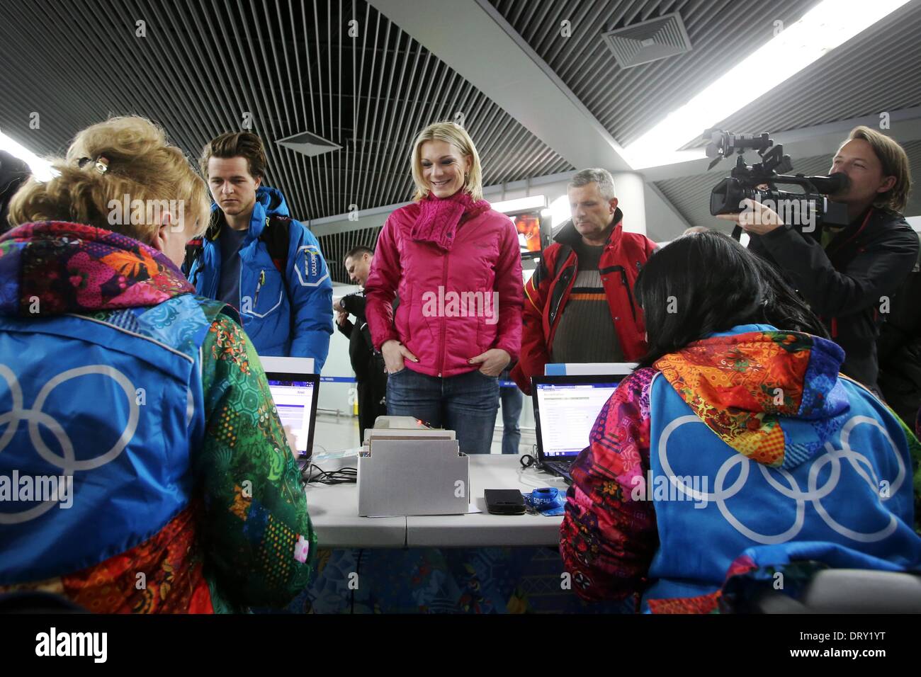 Alpine skier Maria Hoefl-Riesch (C) of Germany arrives at the airport in Sochi, Russia, 04 February 2014. The Olympic Winter Games 2014 in Sochi run from 07 to 23 February 2014. Photo: FREDERICK VON ERICHSEN/dpa Stock Photo