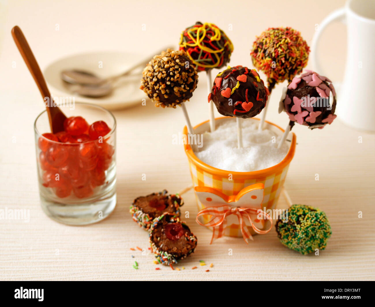 Chocolate cake pops with cherries. Recipe available Stock Photo Alamy