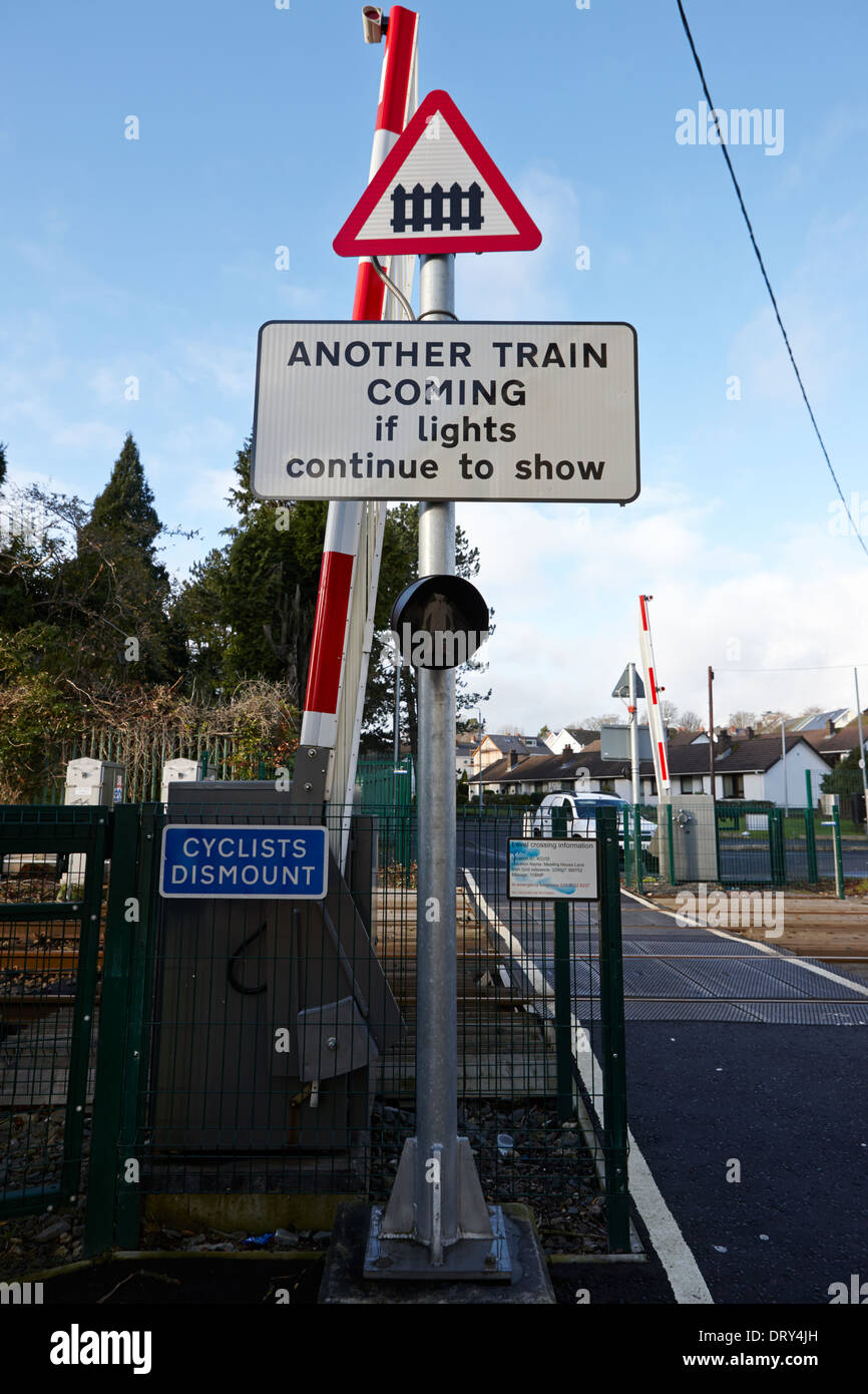 small pedestrian local level crossing warning signs dunmurry belfast uk Stock Photo