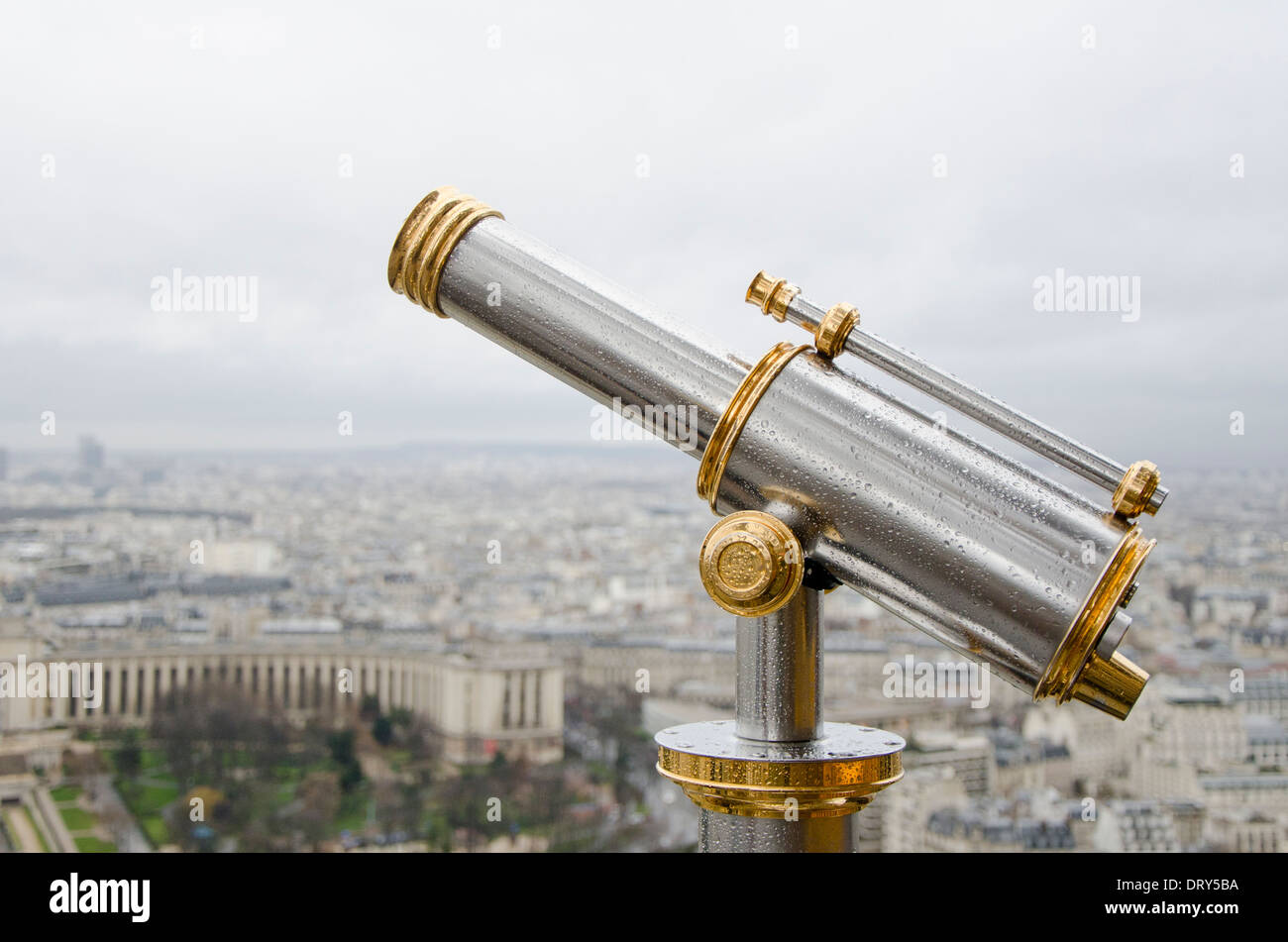 Telescope at second level of Eiffel Tower with Trocadero in background, Paris, France. Stock Photo